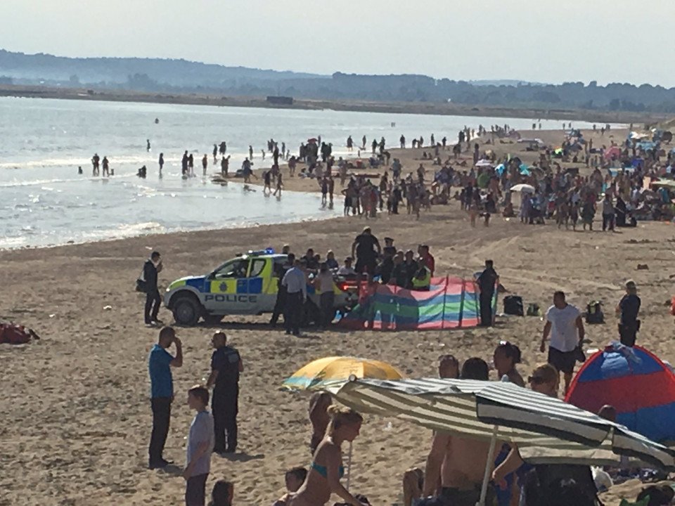 Coastguard and air ambulance at the scene in Camber Sands after reports three people were pulled from the sea. See National News story NNSANDS; Three swimmers were rescued from the sea as bathers looked on in shock today (Weds). Two rescue helicopters were scrambled to help the trio, who were given CPR treatment on the packed beach. The air ambulance and the search and rescue coastguard helicopters landed at the scene in Camber Sands, Kent shortly before 2.30pm. Paramedics gave emergency treatment to the casualties on the sand, while helicopters circled in the sky above. A spokesman for the Maritime and Coastguard Agency said they received a report at 2.15pm that "three people required urgent medical attention". Helicopters from Lydd and Lee-on-Solent in Hampshire were called. The spokesman added: "There is also a Senior Coastal Operations Officer on scene. An air ambulance has also been sent to the location. *** Local Caption ***