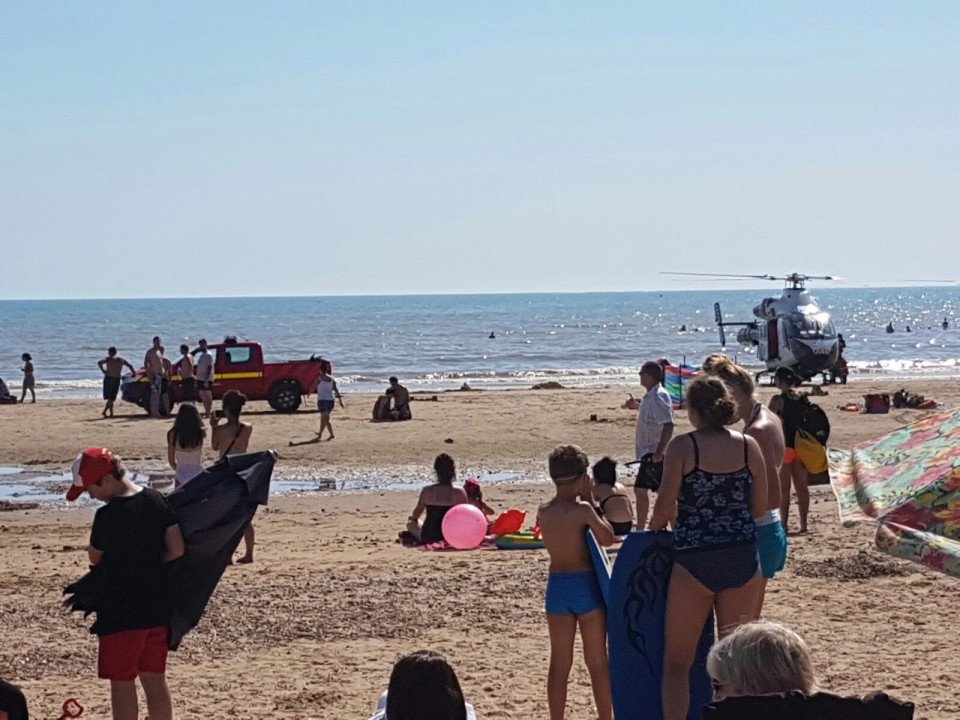 Coastguard and air ambulance at the scene in Camber Sands after reports three people were pulled from the sea. See National News story NNSANDS; Three swimmers were rescued from the sea as bathers looked on in shock today (Weds). Two rescue helicopters were scrambled to help the trio, who were given CPR treatment on the packed beach. The air ambulance and the search and rescue coastguard helicopters landed at the scene in Camber Sands, Kent shortly before 2.30pm. Paramedics gave emergency treatment to the casualties on the sand, while helicopters circled in the sky above. A spokesman for the Maritime and Coastguard Agency said they received a report at 2.15pm that "three people required urgent medical attention". Helicopters from Lydd and Lee-on-Solent in Hampshire were called. The spokesman added: "There is also a Senior Coastal Operations Officer on scene. An air ambulance has also been sent to the location. *** Local Caption ***