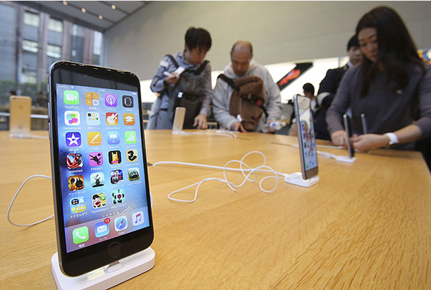 New iPhone 6s models are on display at an Apple store in Tokyo as Apple Inc. launched the sales of the latest models of its popular smartphone in Japan Friday, Sept. 25, 2015. Apple is counting on sales of the new iPhones to maintain its position as one of the most profitable, and valuable, companies in the world. (AP Photo/Koji Sasahara)