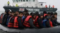 Akár 10 000 fontot is visszafizettetne a brit kormány a menedékkérőkkel, miután munkába állnak