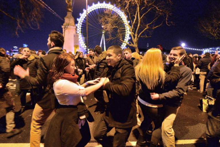 Revellers in central London during the New Year celebrations. PRESS ASSOCIATION Photo. Picture date: Thursday December 31, 2015. Photo credit should read: Anthony Devlin/PA Wire